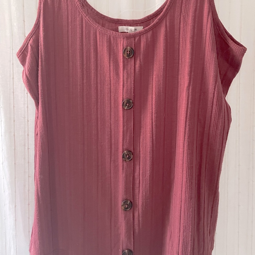 A pink basic tank